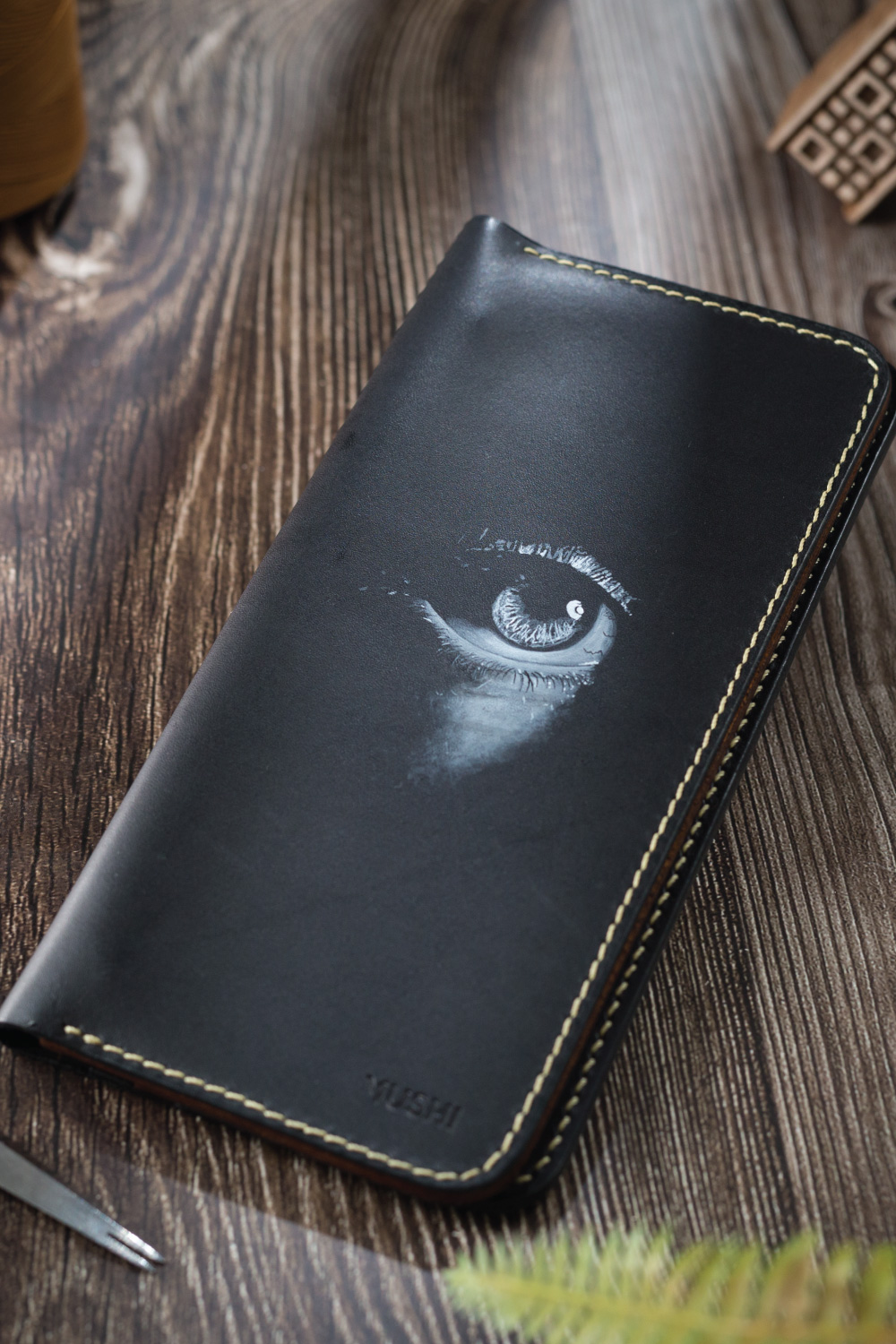 DEEP VISION: Abstract Eyes Art on Wallet by MUSHI Abstract Eyes Art on Wallet in Grey colour by MUSHI
