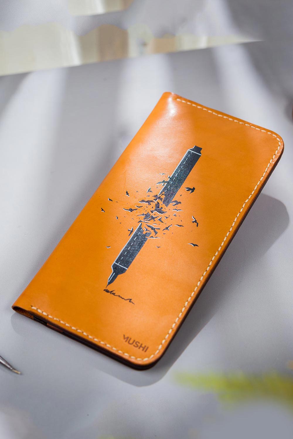 Imported genuine long leather wallet in beige with birds breaking free painting in Pakistan.