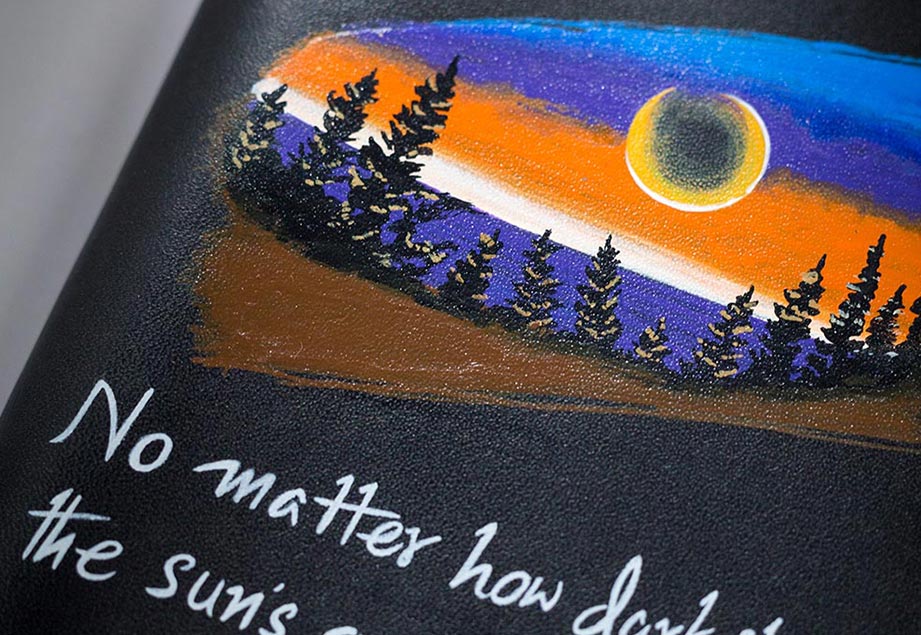 Imported genuine long leather wallet in black with sunset and trees painting in Pakistan.