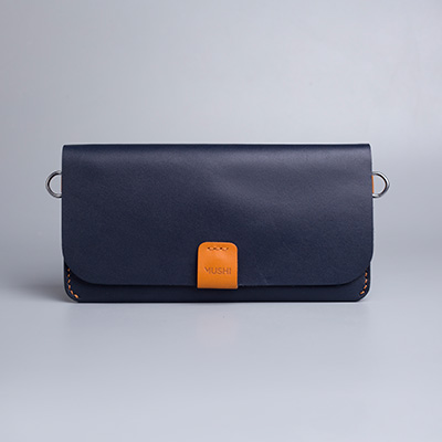 Carry-On-Wallet-Shade-One-Image Carry on leather wallet with shoulder strap in navy in Pakistan.