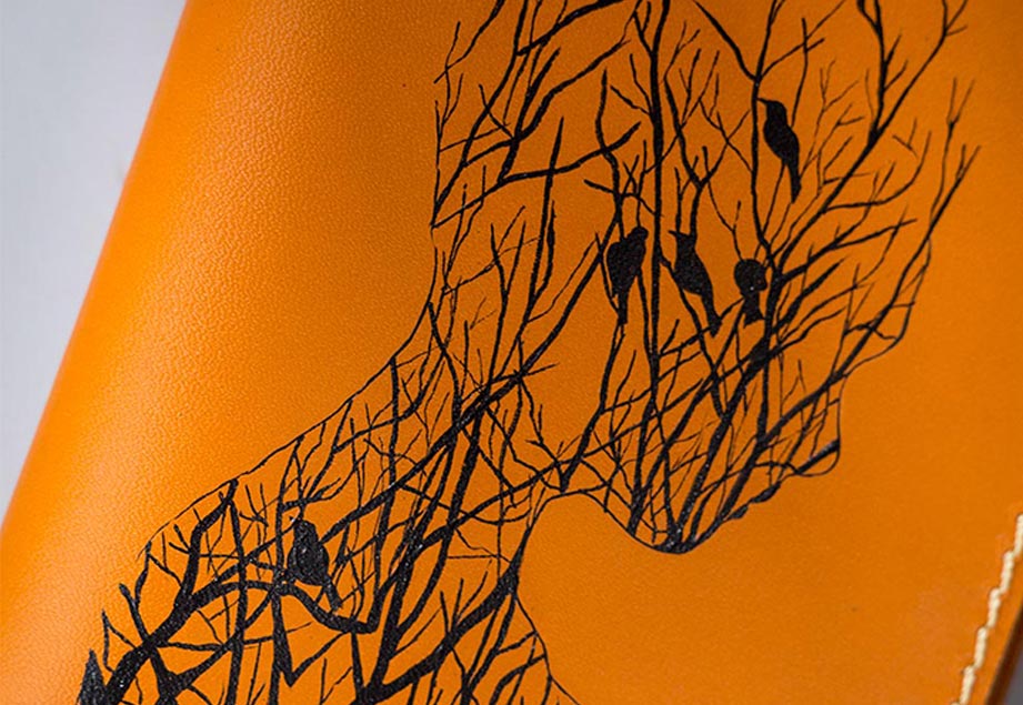 Imported genuine long leather wallet in beige with human silhouette painting in Pakistan.