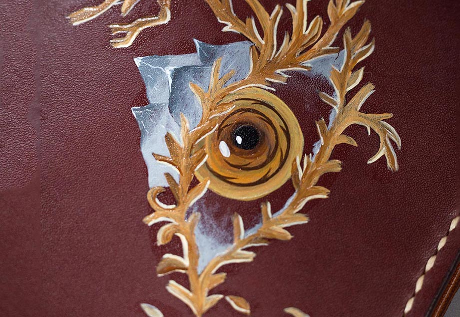 Imported genuine long leather wallet in burgundy with eye and the mountain painting in Pakistan.