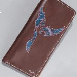 Imported genuine long leather wallet in burgundy with girl silhouette painting in Pakistan.