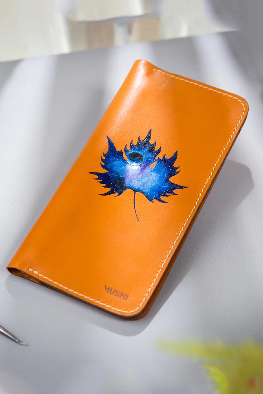 Imported genuine long leather wallet in beige with sky in a leaf painting in Pakistan.