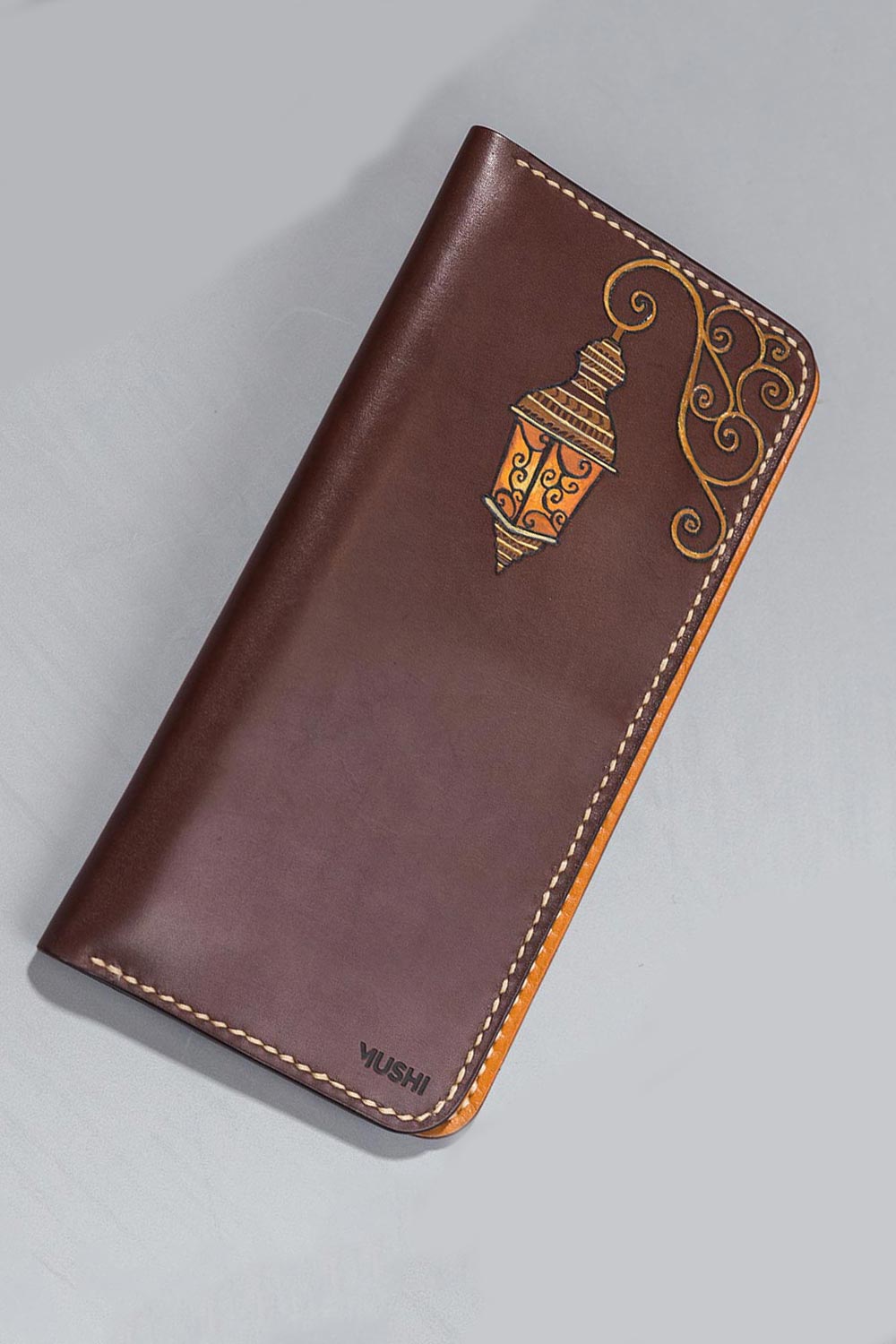 The-lanter-Vision-Feature-Imagge Imported genuine long leather wallet in burgundy with lantern painting in Pakistan.