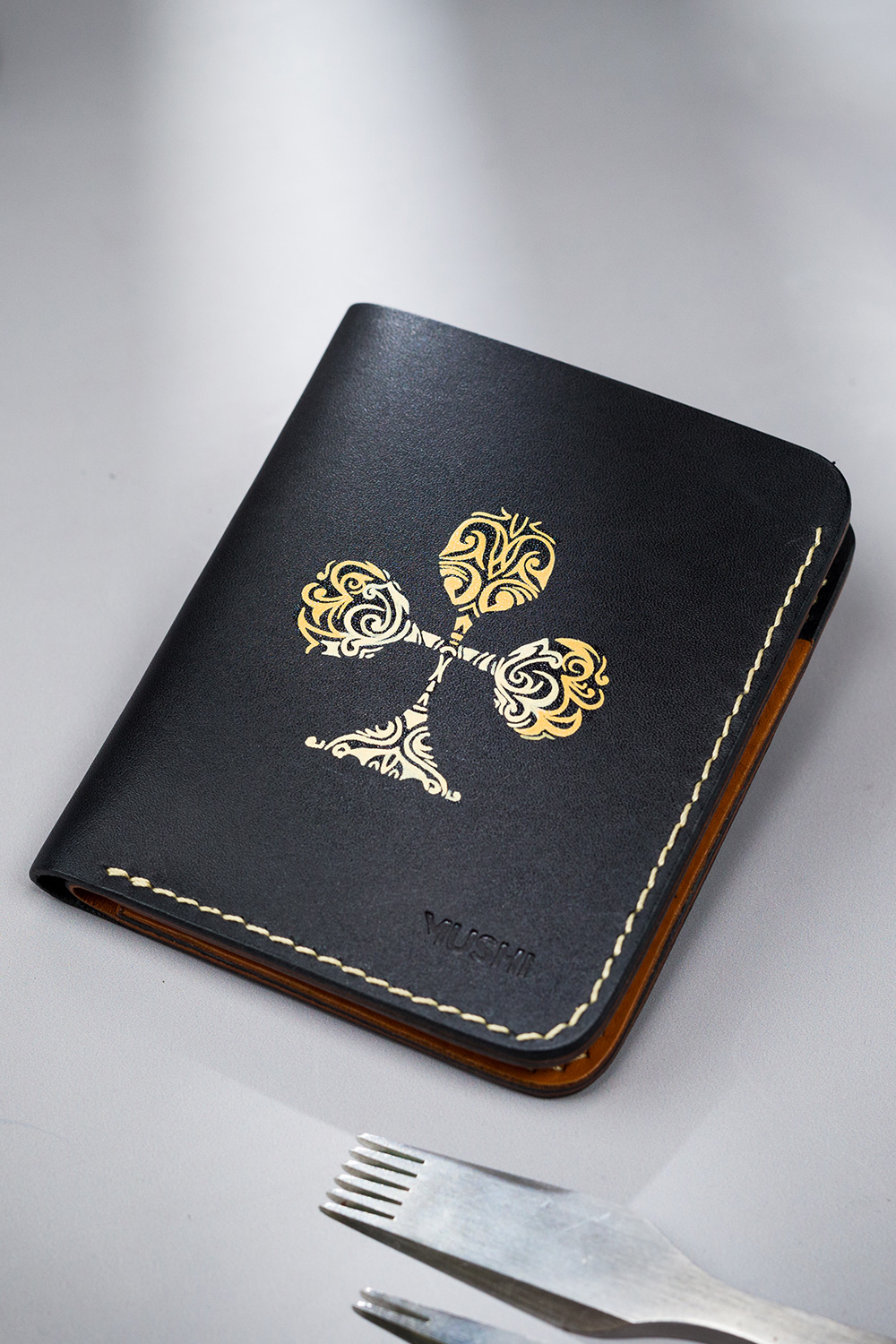 Club-Abstract-Featured-Image Black vegetable-tanned leather with a club abstract design.