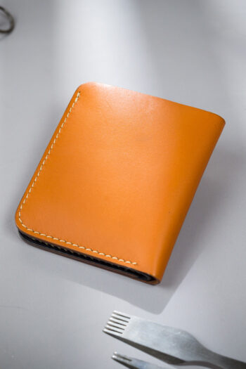Beige vegetable-tanned leather with a heart abstract design.