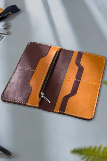 Imported genuine long leather wallet in burgundy with green parrot painting in Pakistan.