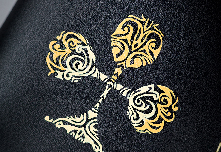 CLUB-ABSTRACT-FOOTER-IMAGE-ONE Black vegetable-tanned leather with a club abstract design.