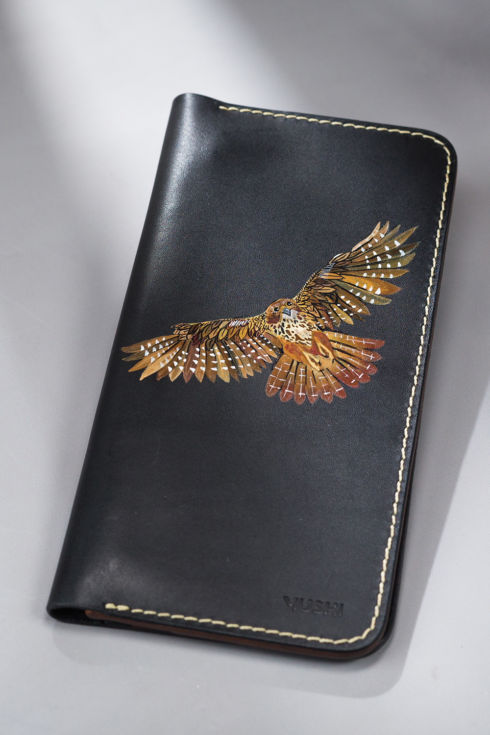 OWL'S-WING-SPAN-FOOTER-IMAGE-TWO Imported genuine long leather wallet in black with owl flying painting in Pakistan.