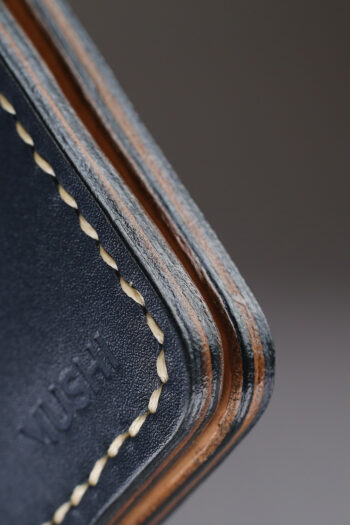 Imported genuine long leather wallet in black with colourful bird illustration in Pakistan