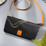 Hand-painted abstract wave design on women’s leather wallet by MUSHI.
