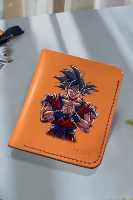 Hand-painted Goku artwork on handcrafted leather wallet for men by MUSHI.