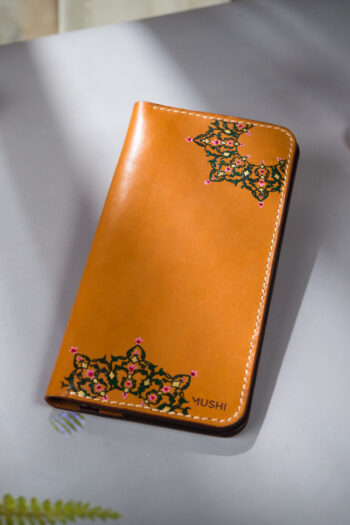 Mandala corner artwork on handcrafted leather wallet