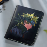 Hand-painted side-face Naruto artwork on leather wallet by MUSHI for anime fans.