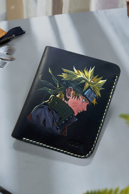 Hand-painted side-face Naruto artwork on leather wallet by MUSHI for anime fans.