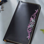 Leather wallet with traditional pink and white hand-painted motif – ideal gift for women