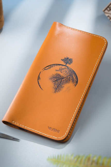 Creative Wallet Art by MUSHI in Pakistan featuring Tree on Earth with widespread roots beneath the Earth surface.